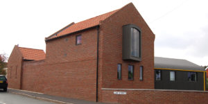 A modern interpretation of the bay window tips its hat towards the view of the Humber